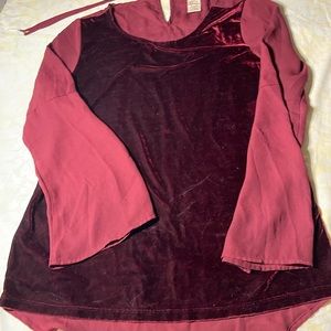 It’s beautiful maroon velvet shirt with see-threw long sleeve’s